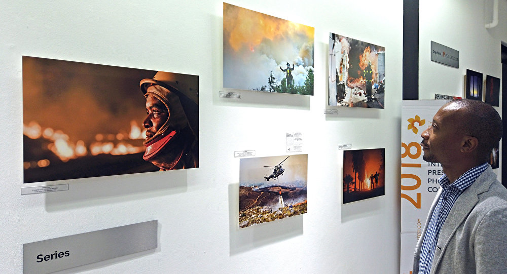 An exhibition of works by talented young photographers selected by the Andrei Stenin Contest jury opened in Johannesburg, South Africa. The exhibition is part of the 2018 winners’ tour that started in Moscow in early November. The winning entries will be on display at the Market Photo Workshop until February 25. An exhibition of works by talented young photographers selected by the Andrei Stenin Contest jury opened in Johannesburg, South Africa. The exhibition is part of the 2018 winners’ tour that started in Moscow in early November. The winning entries will be on display at the Market Photo Workshop until February 25.
