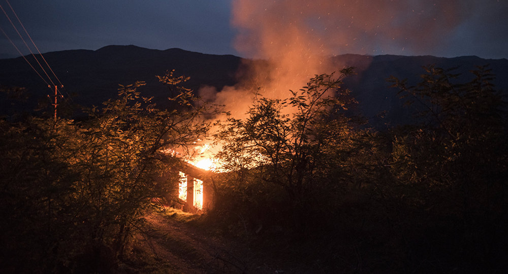 Paradise Lost. A burning house in the Kelbajar region of Nagorno-Karabakh. According to the peace agreement between Armenia and Azerbaijan, the Kelbajar region came under the control of the Azerbaijani authorities. Some residents set fire to their homes before leaving for Armenia. Paradise Lost. A burning house in the Kelbajar region of Nagorno-Karabakh. According to the peace agreement between Armenia and Azerbaijan, the Kelbajar region came under the control of the Azerbaijani authorities. Some residents set fire to their homes before leaving for Armenia.