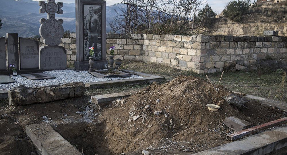 Paradise Lost. A grave in a cemetery in Lachin, Nagorno-Karabakh. Some residents exhumed the remains of relatives and took them to rebury in Armenia, when they left their homes in Nagorno-Karabakh following the November peace agreement. A grave in a cemetery in Lachin, Nagorno-Karabakh. Some residents exhumed the remains of relatives and took them to rebury in Armenia, when they left their homes in Nagorno-Karabakh following the November peace agreement.